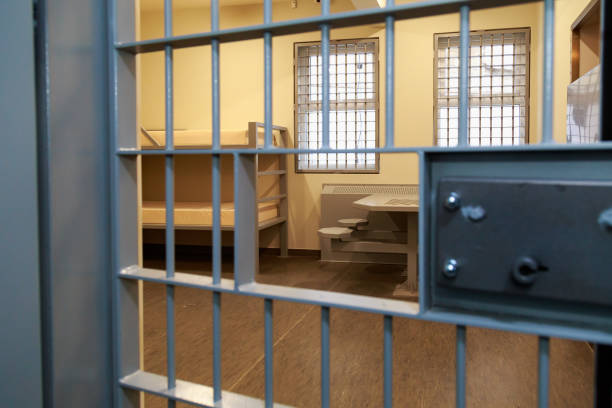 istock modern prison bars. Symbolic illustrative background for crime news 1336287573