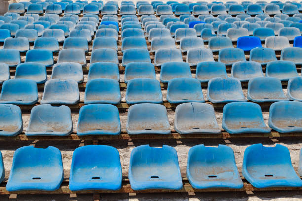 istock Destroyed stadium stands. Broken fan chairs. Selective focus 1336287881