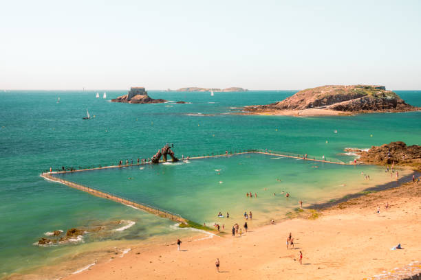 Beach , people and sea open swimming pool in Saint Malo, France stock photo