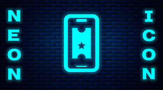 Glowing neon Buy cinema ticket online icon isolated on brick wall background. Service Concept. Vector.