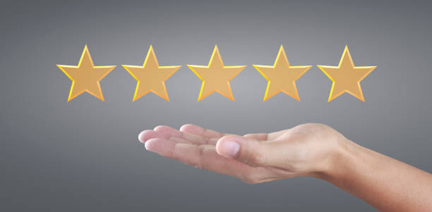 istock Hand and increasing five stars. Increase rating evaluation 1336294407