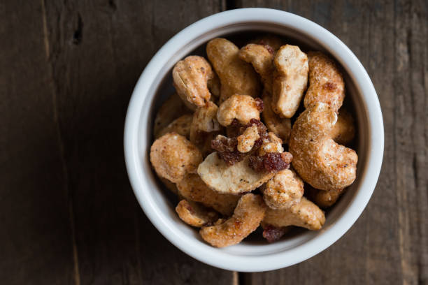 istock glazed cashew nuts with dried pomegranate 1336295115