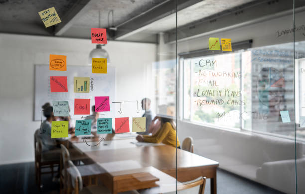 istock Business team brainstorming in a meeting about their CRM strategy 1336299065