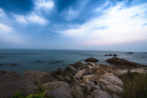 Shooting at sunrise by the sea in Shandong Province