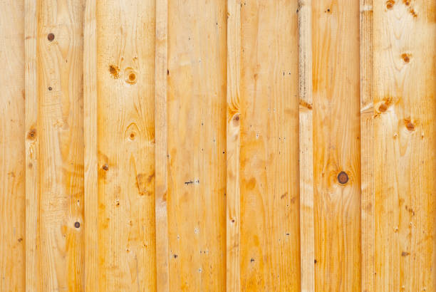 istock Wall texture with striped paneling. Wood paneling close up. 1336299469