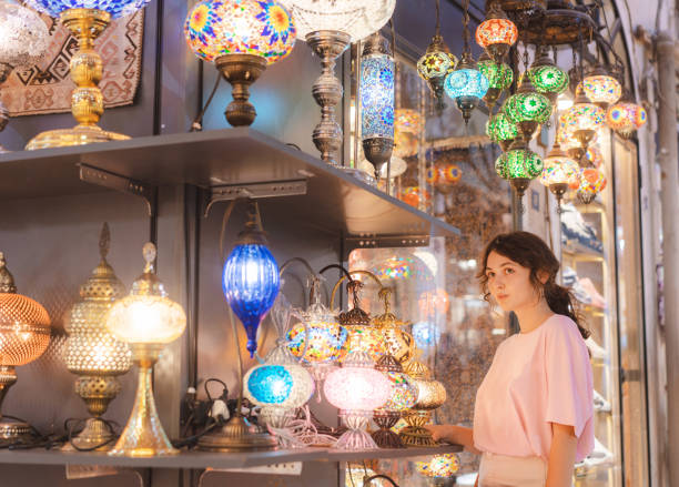 istock Woman choosing lamp on Grand Bazaar in Istanbul 1336299499