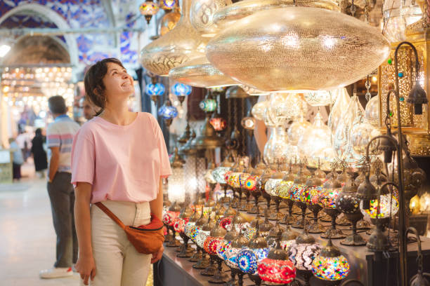 istock Woman choosing lamp on Grand Bazaar in Istanbul 1336299532