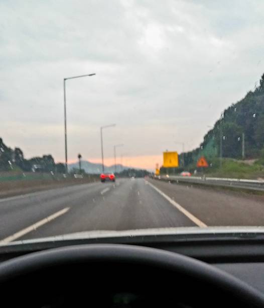 istock Sunset Highway Filmed in a Car a blurry picture 1336303361