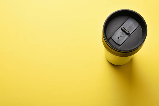 https://media.istockphoto.com/id/1336308167/photo/insulated-drink-container-coffee-mug-on-the-yellow-background-with-copy-space.jpg?s=612x612&w=0&k=20&c=pwlloPlcT2IRXCN2zzAMCYnV8R-7F8GLNL5ATGoLYdI=