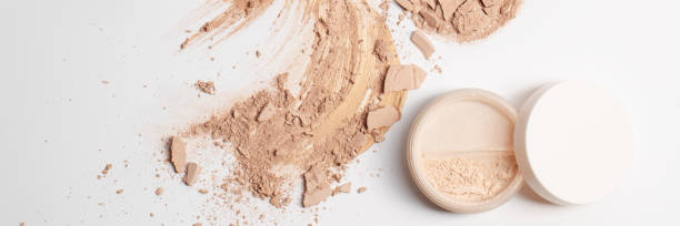 istock Set with Crashed beige face powder and finishing powder  isolated on white background 1336311005