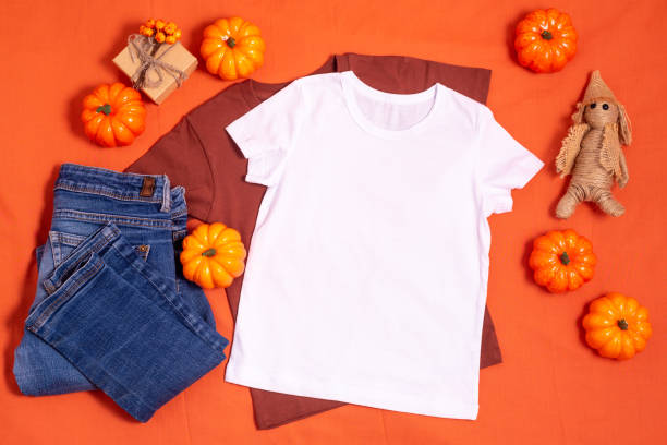 istock White t-shirt mockup on orange halloween background 1336318474
