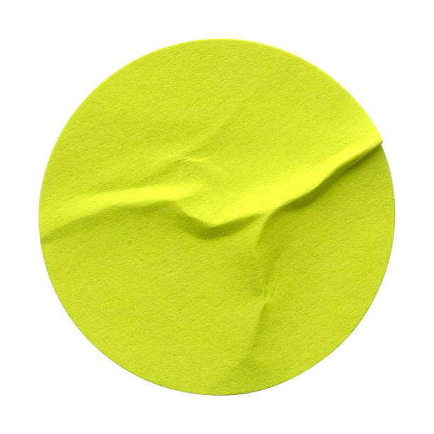 istock Green circle paper sticker label isolated on white background 1336319489