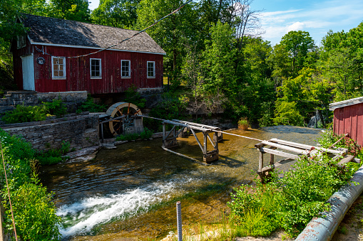 Bennington, Vermont - USA, October 25, 2023. Old hydro powered paper mill along the Walloomsac river in Bennington Vermont.