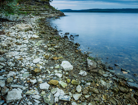 close-up of a stones and water near the bank, Bakota bay (Dnistrovske reservoir), Dnister river, Podilski tovtry National park, Khmelnitskiy region of Western Ukraine