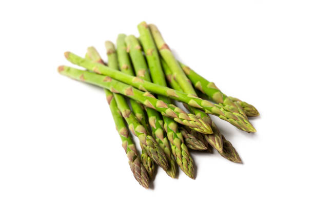 istock Green asparagus sticks isolated on white background 1336321784