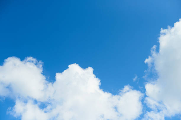 istock Natural daylight and white clouds floating on blue sky 1336323574