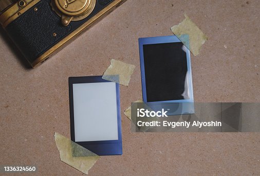 istock Two blank photo frame with on brown background as template for graphic design. Photo cards 1336324560
