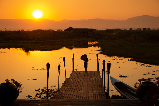 Sunset over the landscape of Inle Lake, Myanmar.