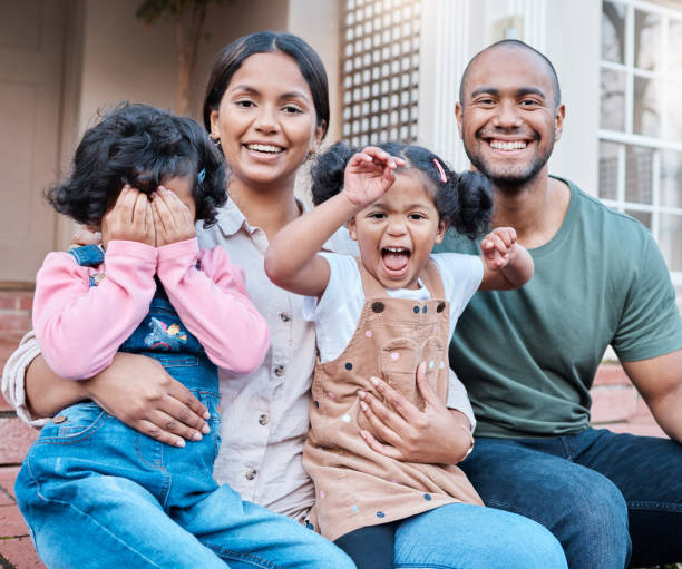 istock Shot of a couple spending time outside with their two daughters 1336335053