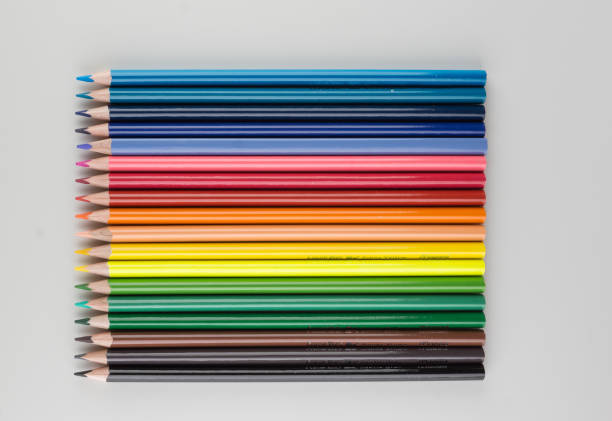 set of colored pencils lined up hardly