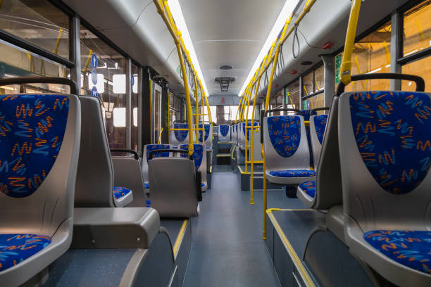 istock Interior of modern trolleybus. Passenger compartment. Background 1336342315