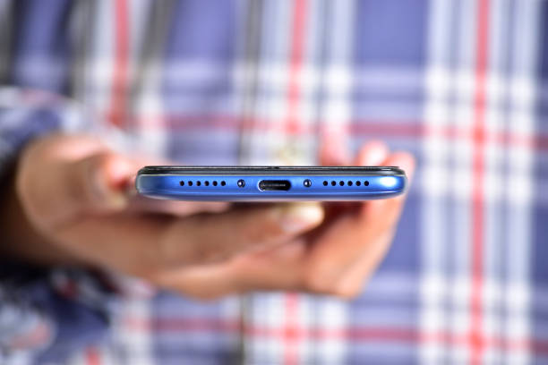 istock Charging slot in smartphone 1336344502