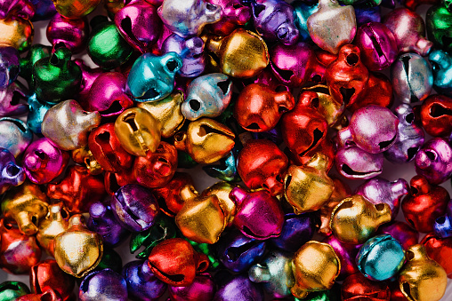 Close up of Christmas colorfull jingle bell decoration texture background. Christmas or New Year pattern.