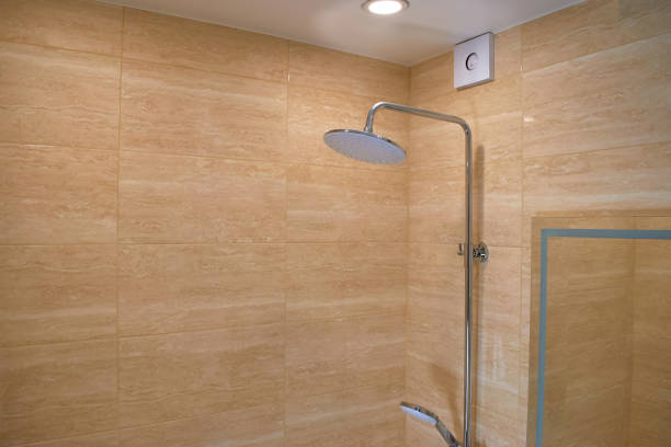 istock Rain shower in the bathroom. Bathroom interior. Rain shower head 1336344956