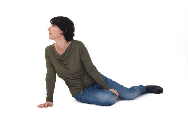 istock woman sitting on white background 1336345605