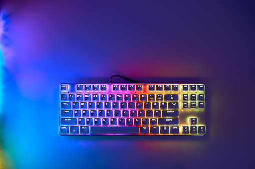 Mechanical gaming keyboard with backlight, top view. Gaming keyboard with RGB backlight. RGB LED keyboard.