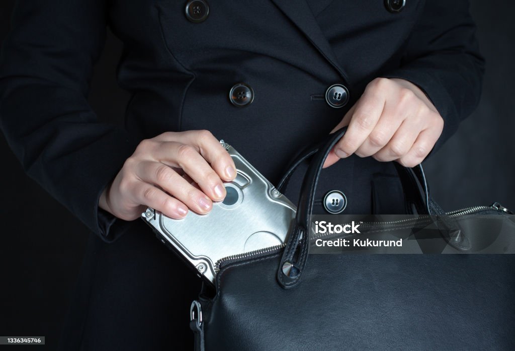 a hard drive or a server with corporate confidential information was stolen by an employee or thief for sale to competitors or confiscated by state tax authorities for investigation Computer File Stock Photo