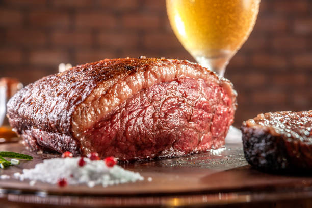 istock Grilled cap rump steak and beer (brazilian picanha) 1336348563