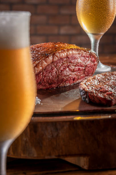 istock Grilled cap rump steak and beer (brazilian picanha) 1336348570