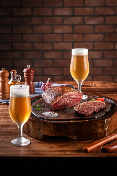 istock Grilled cap rump steak and beer (brazilian picanha) 1336348574