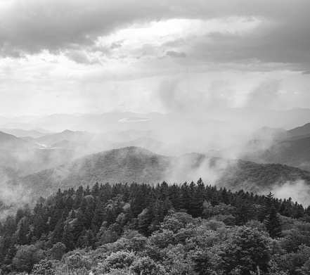 Black and white mountain  landscape, Beautiful mountain panorama with fogg and layers of  hills. View of Smoky Mountains from Blue Ridge Parkway on a foggy day. Near Asheville, North Carolina.