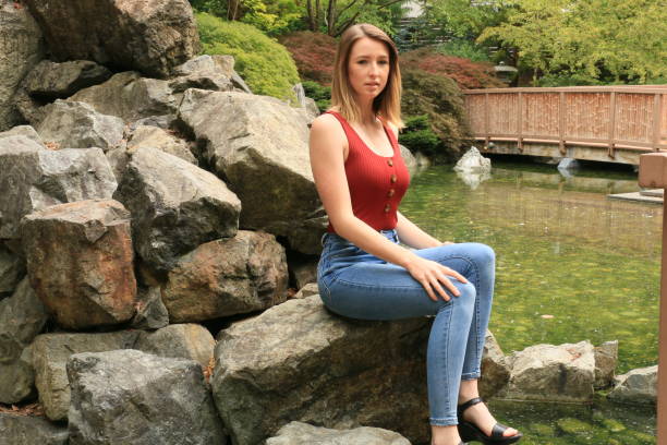 Sitting on a Rock in a Garden