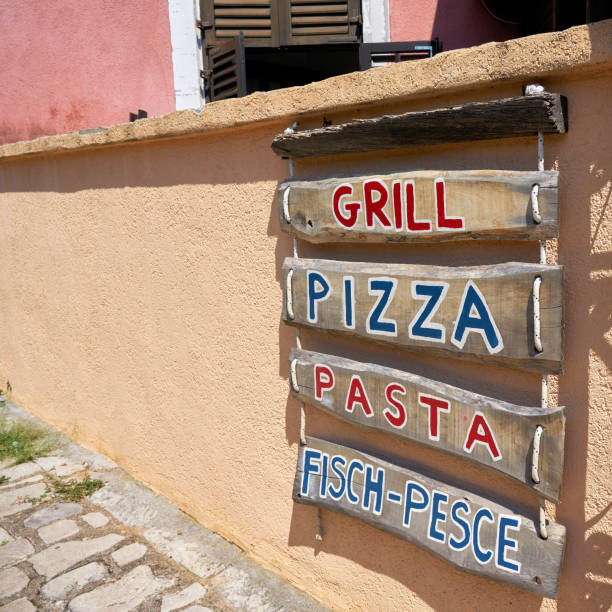 istock Advertisement for a typical restaurant in Krk in Croatia 1336356044