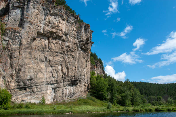 istock Rocks on the banks of a mountain river 1336358977