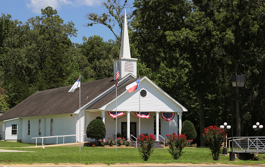 Small White church With Flags in Rural Texas