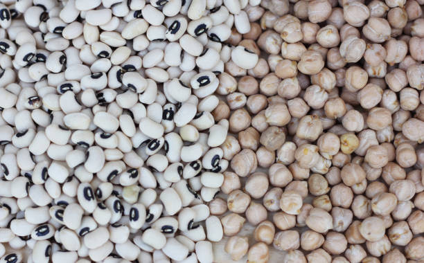 istock Spilled Black Eyed Peas and Chickpeas spilled on table 1336361326