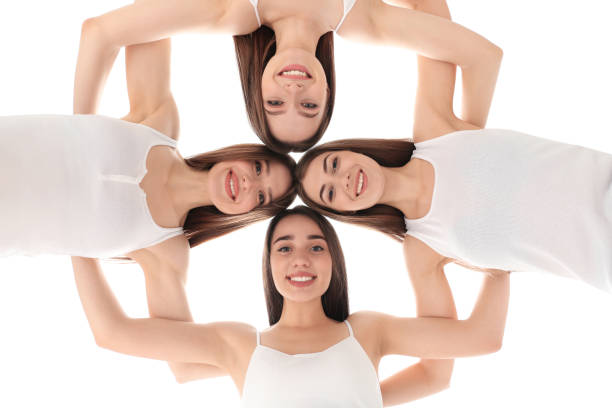 istock Beautiful young ladies hugging, bottom view. Woman's Day 1336361805