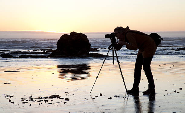 istock She Photographs the Beach 133636526