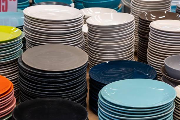 istock Plates and utensils in self service store. Background 1336369697