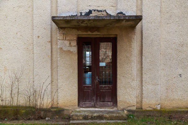 Doors of an old abandoned industrial building. Background