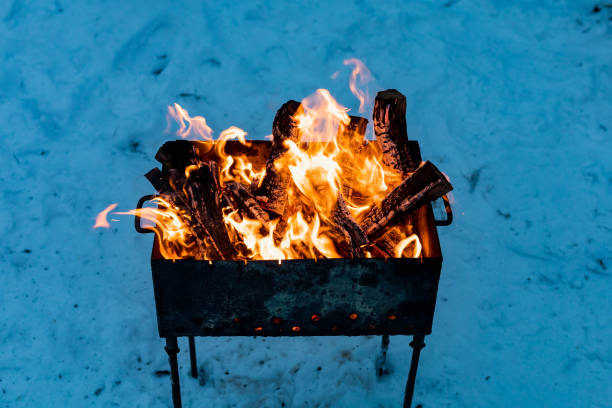 istock Brazier with fire and coals for cooking on the fire. 1336370210
