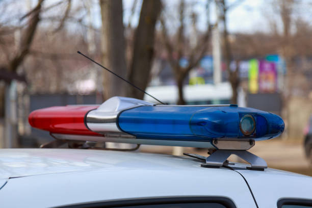 istock flasher on a police car. Emergency call symbol. Abstract blurred background with selective focus. 1336371082