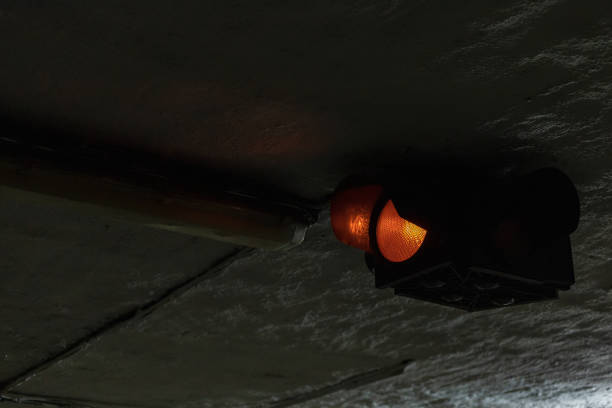 istock Traffic light in dark underground city. Background 1336371349