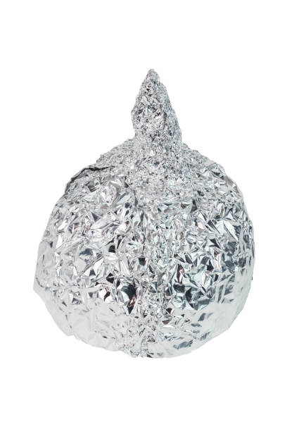 istock Aluminium foil hat isolated on white background, symbol for conspiracy theory and mind control protection. 1336373965