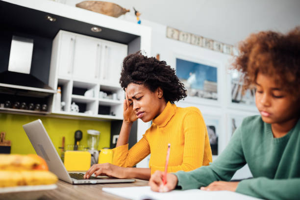 istock African American mother working from home 1336374062