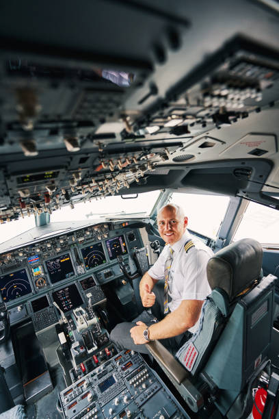 istock Joyous male pilot showing his readiness for take-off 1336374930